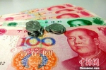 人民币资料图。中新网记者 李金磊 摄 - 上饶之窗