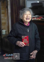 “一毛钱奶奶”说新年愿望（图） - 中国江西网